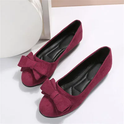 Effen kleur slip-ons met ronde neus en strik