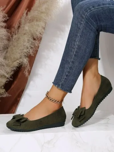 Effen kleur slip-ons met ronde neus en strik