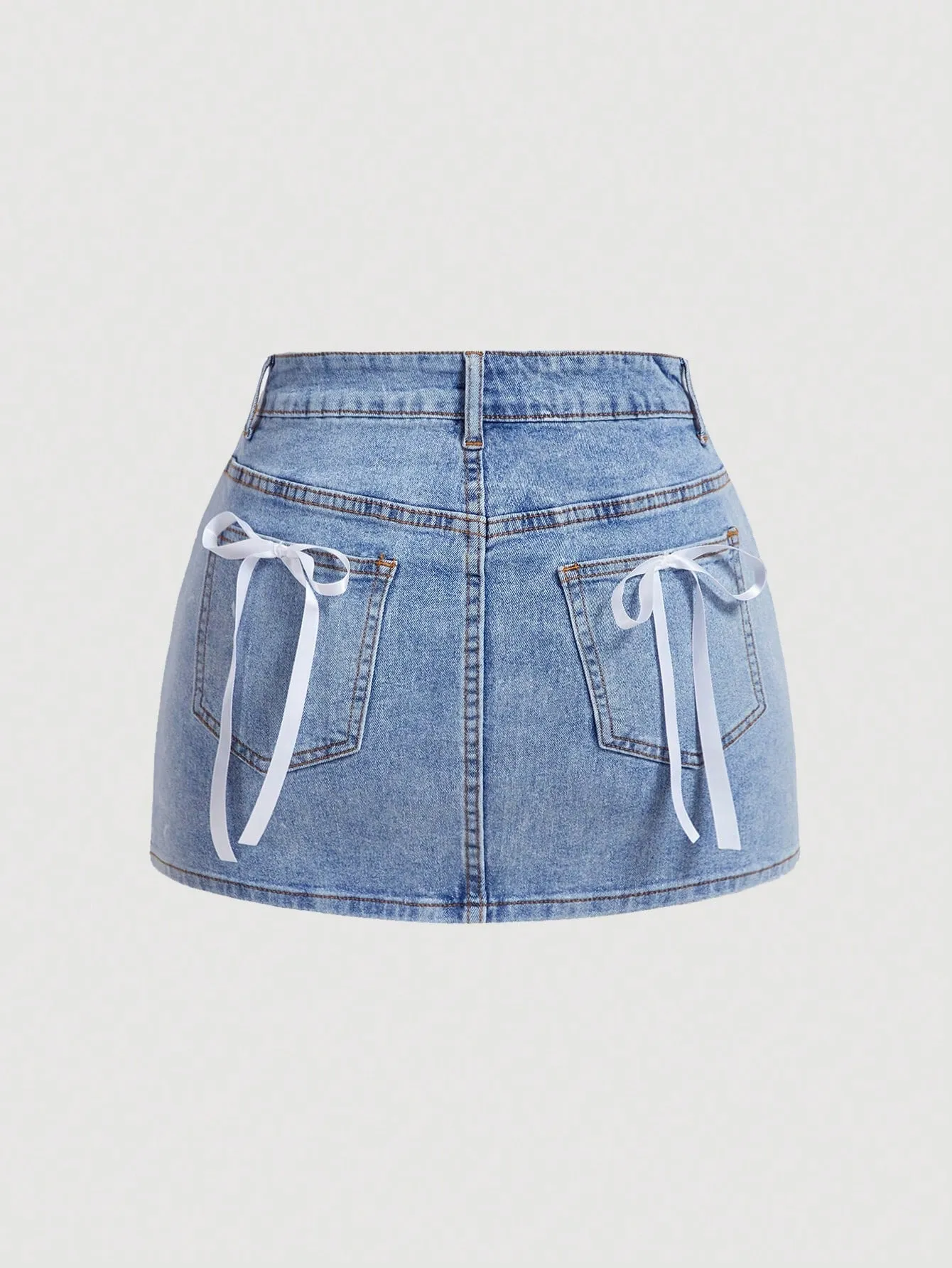 Falda mini de mezclilla con lazo para el verano